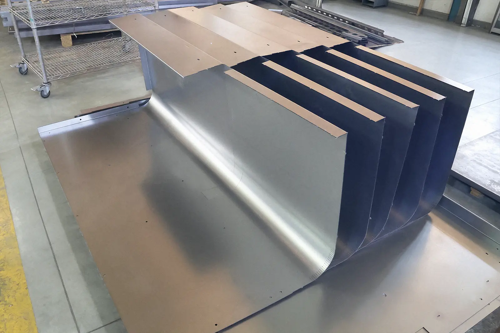 Large CNC-bent sheet-metal parts with complex bends