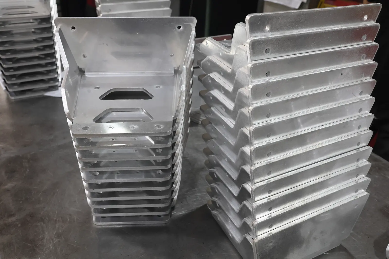 Stacked CNC-bent aluminum mounting brackets