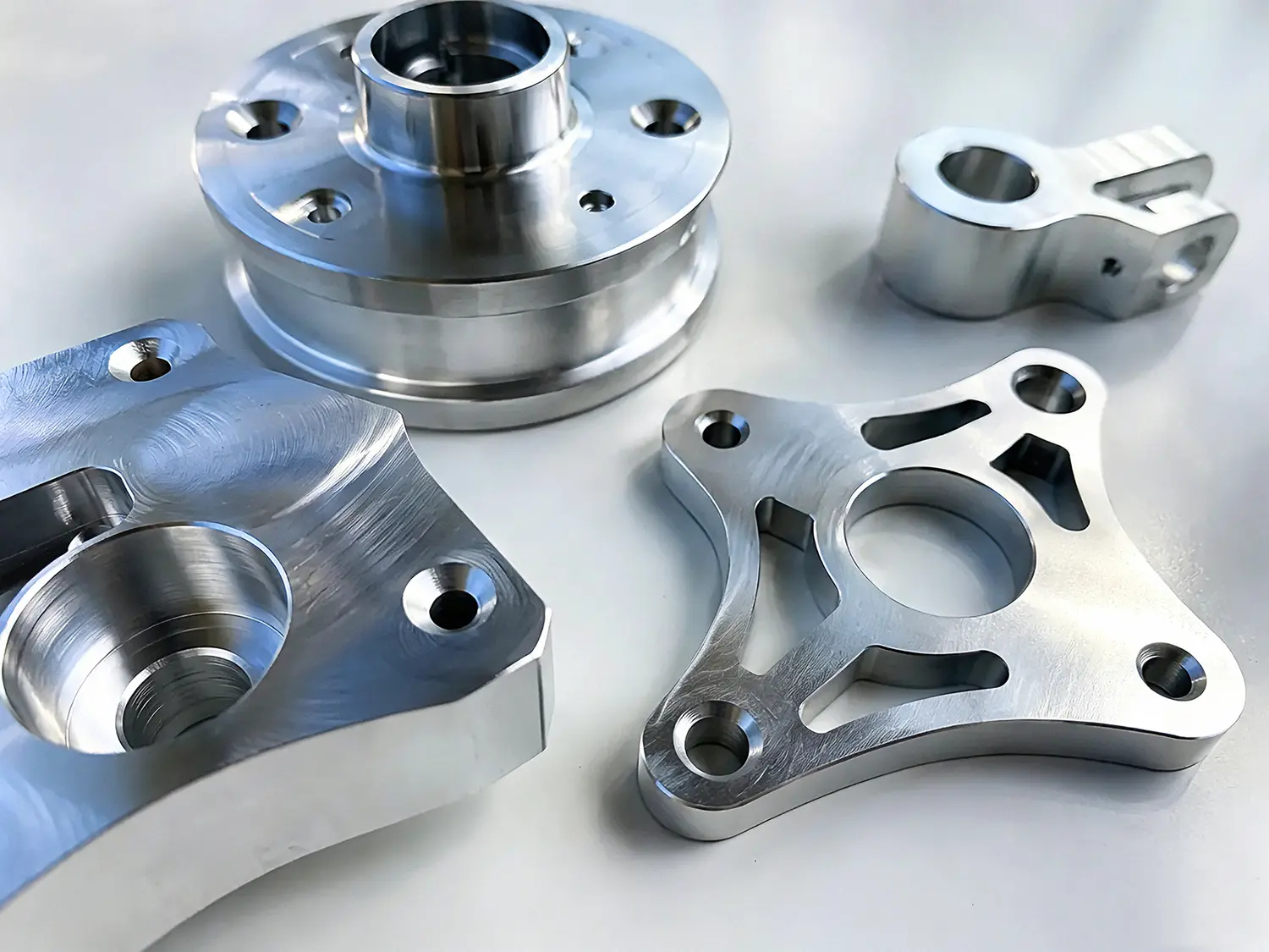 Custom CNC-machined aluminum parts with polished finishes