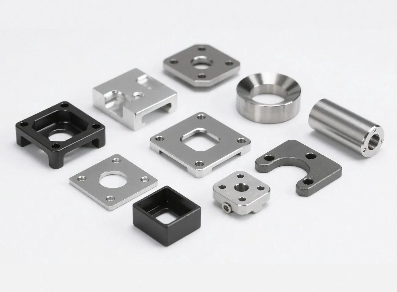 Laser-cut metal components with anodized, powder-coated, and polished finishes